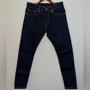 Levi’s 512 Tapered Jeans. Size: 31x32. Color: Dark wash.